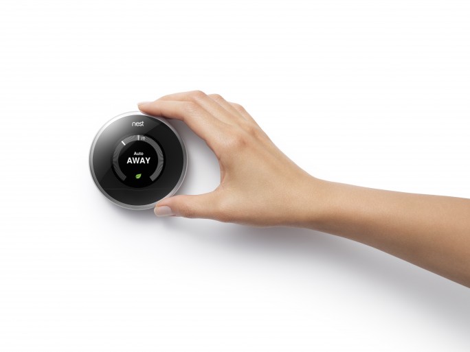 nest_thermostat_with_hand-684x513